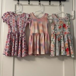 (3) bundle Dot Dot Smile Dress. Size 12/24 months. Condition: good no damage.